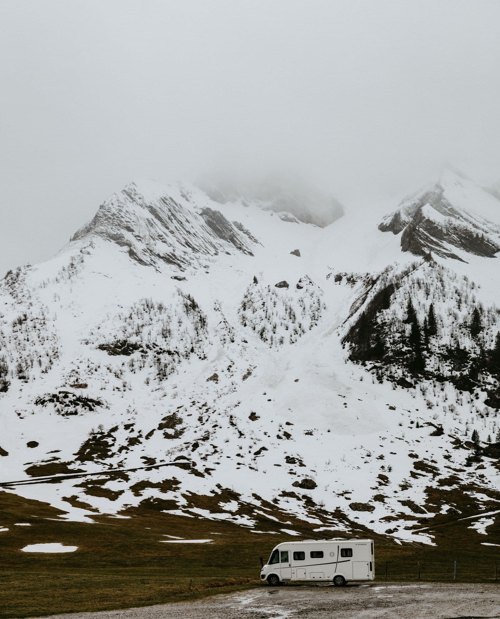 Oversize Vehicle Entry in a snowy mountain setting