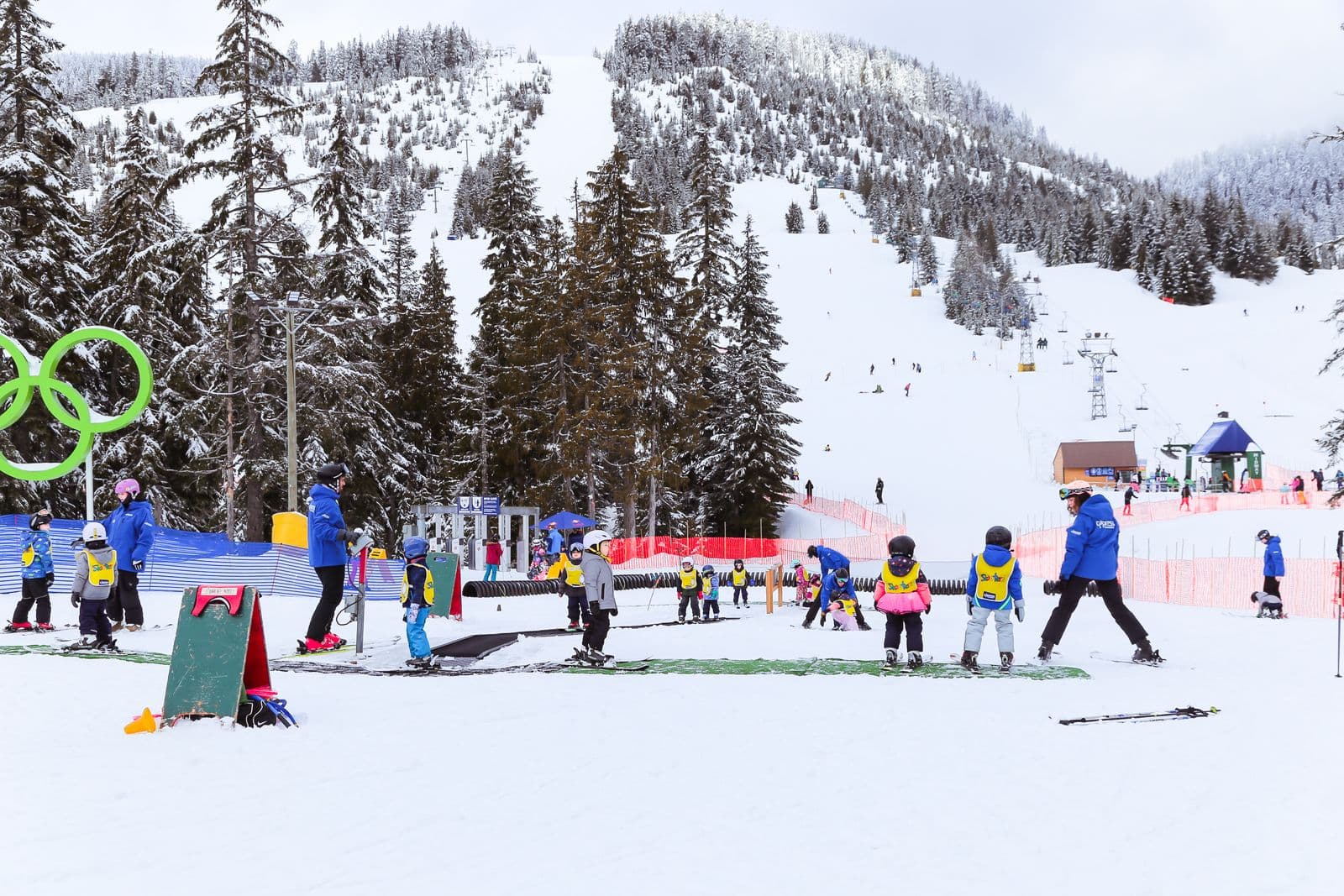 Beginner Snowboard Lesson in a snowy mountain setting